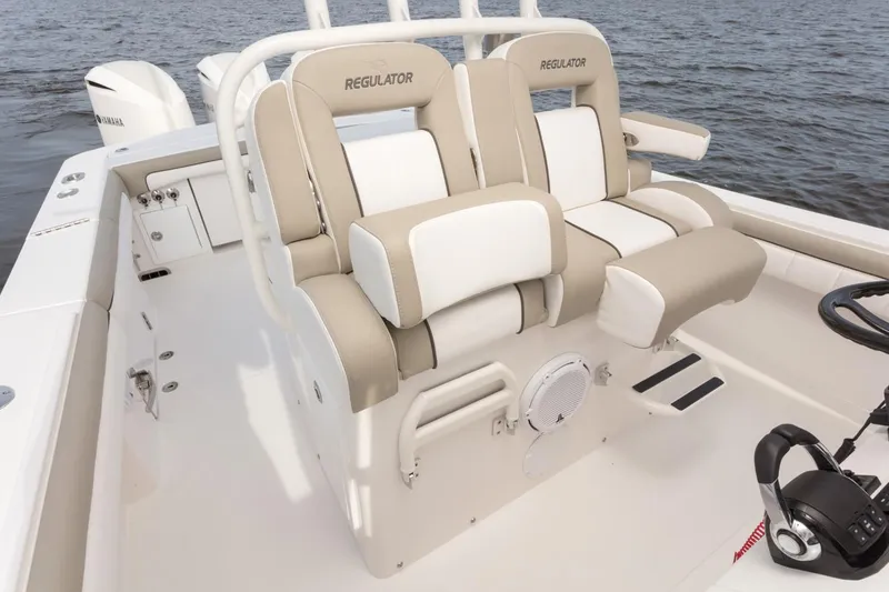 Slide: The Image of 2019 Regulator 34SS boat sink and storage area with dual compartments. - 20