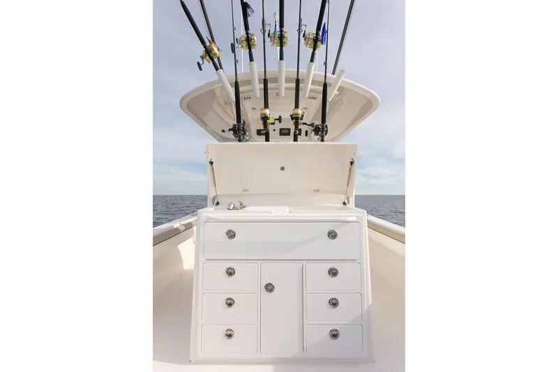 Slide: The Image of 2019 Regulator 34SS boat deck with Yamaha engines at marina. - 21
