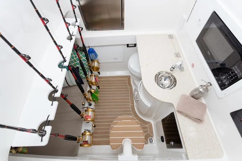 Slide: The Image of 2019 Regulator 34SS boat with Garmin radar, docked at marina. - 31