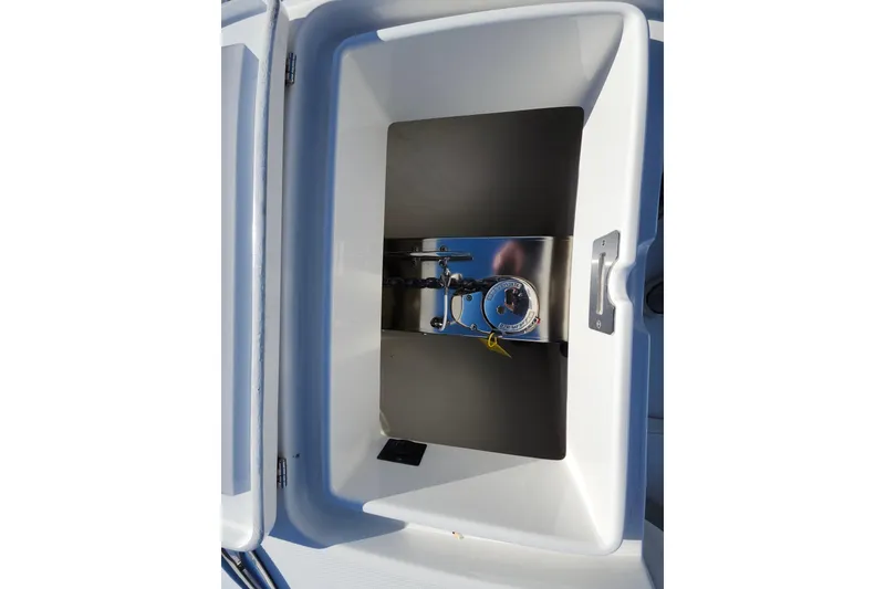Slide: The Image of 2019 Regulator 34SS boat hull detail with trim tab and underwater light. - 40