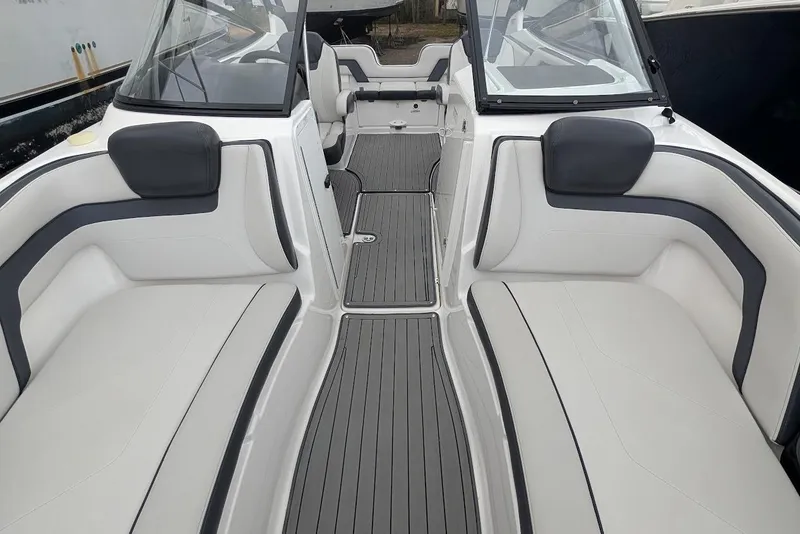 Slide: The Image of 2017 Yamaha 242 Limited S boat interior with sleek seating and modern design. - 20