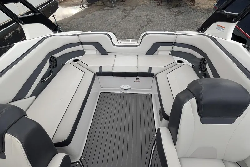 Slide: The Image of 2017 Yamaha 242 Limited S boat interior with sleek seating and modern design. - 7
