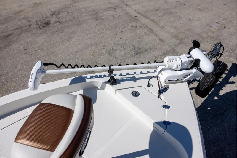 Slide: The Image of 2018 Ranger 2510 Bay Ranger boat with Minn Kota trolling motor on deck. - 16