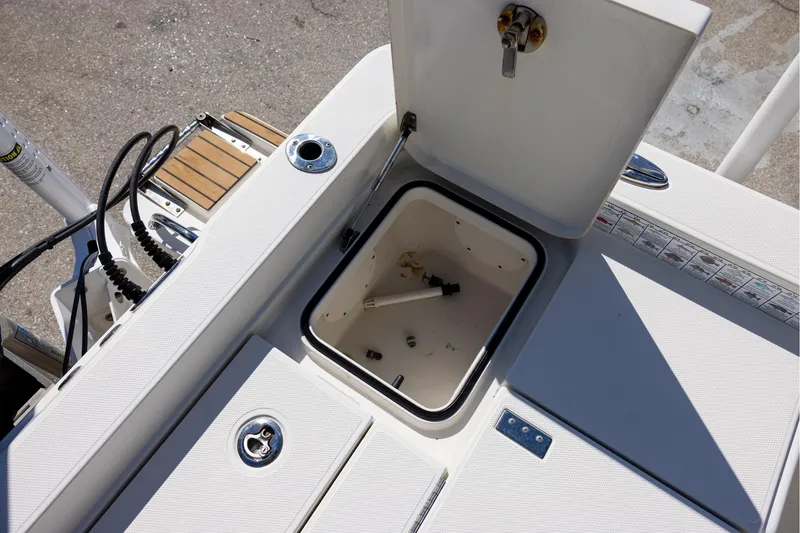Slide: The Image of 2018 Ranger 2510 Bay Ranger boat storage compartment open on deck. - 20