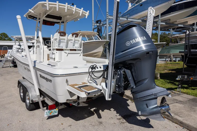 Slide: The Image of 2018 Ranger 2510 Bay Ranger boat with Yamaha outboard motor on trailer. - 5