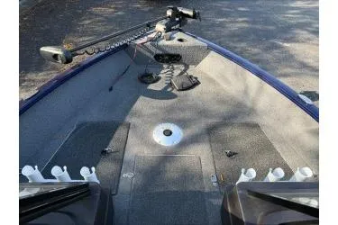 Slide: The Image of 2023 Tracker Pro Guide V-175 WT boat deck with fishing rod holders and trolling motor. - 6