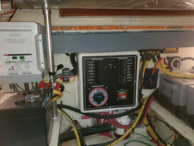 Slide: The Image of Electrical panel and wiring inside a 2007 Mainship 400 Trawler boat. - 21