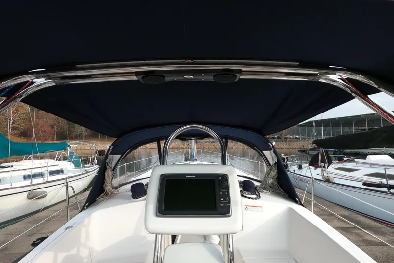 Slide: The Image of Cockpit view of 2013 Marlow-Hunter e33 sailboat with navigation equipment. - 10