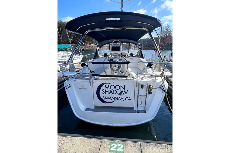 Slide: The Image of 2013 Marlow-Hunter e33 sailboat docked, named "Moon Shadow," in Savannah, GA. - 7