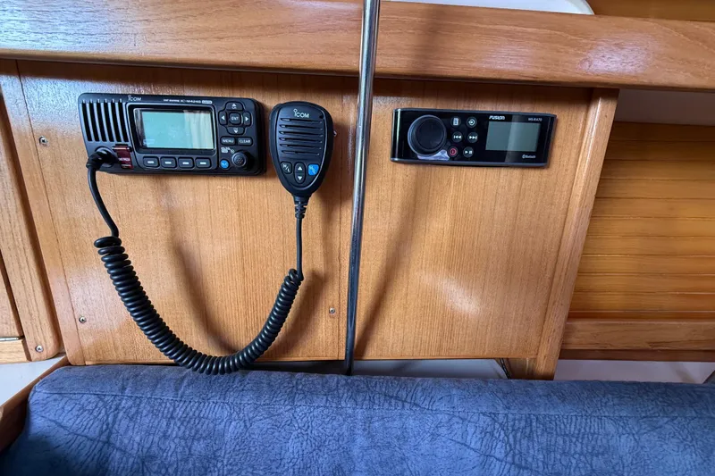Slide: The Image of Boat interior with communication and audio equipment on a Catalina 320, year 2000. - 17