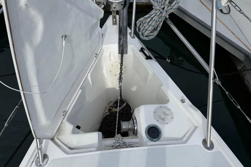 Slide: The Image of Anchor locker of a 2000 Catalina 320 sailboat with chain and rope. - 7
