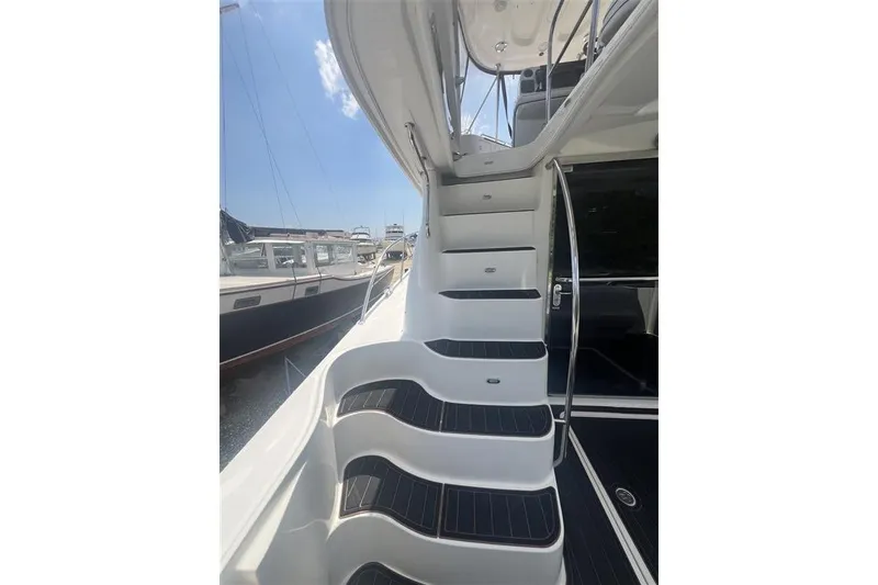 Slide: The Image of Staircase on 2007 Sea Ray 52 Sedan Bridge yacht, leading to upper deck. - 1
