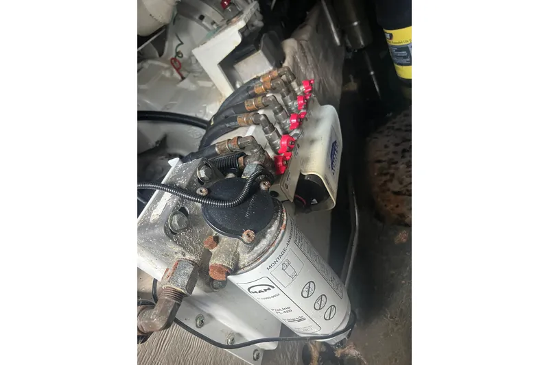 Slide: The Image of Engine compartment of a 2007 Sea Ray 52 Sedan Bridge with visible fuel filter. - 15