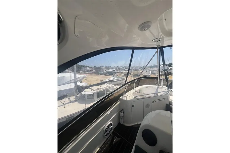 Slide: The Image of Interior view of 2007 Sea Ray 52 Sedan Bridge yacht at marina. - 33