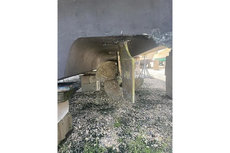 Slide: The Image of 2007 Sea Ray 52 Sedan Bridge propeller and hull on dry dock. - 35