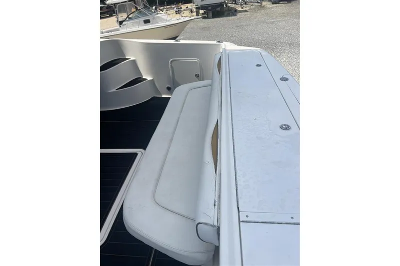 Slide: The Image of 2007 Sea Ray 52 Sedan Bridge boat deck with seating area. - 8