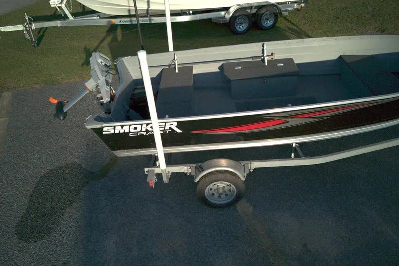 Slide: The Image of 2021 Smoker Craft 14 Big Fish boat on trailer, side view. - 10