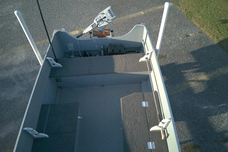 Slide: The Image of 2021 Smoker Craft 14 Big Fish boat interior with fishing rod holders. - 7