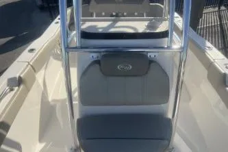Slide: The Image of 2023 Key West 203 FS boat interior with seating and console. - 10