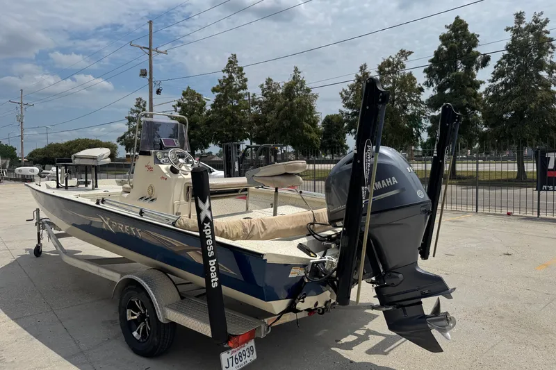 Slide: The Image of 2015 Xpress H20 boat with Yamaha engine on trailer, parked outdoors. - 3