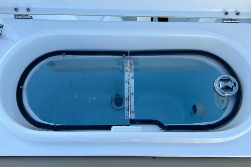 Slide: The Image of Livewell on 2017 Key West Billistic 281 Center Console boat, filled with water. - 11