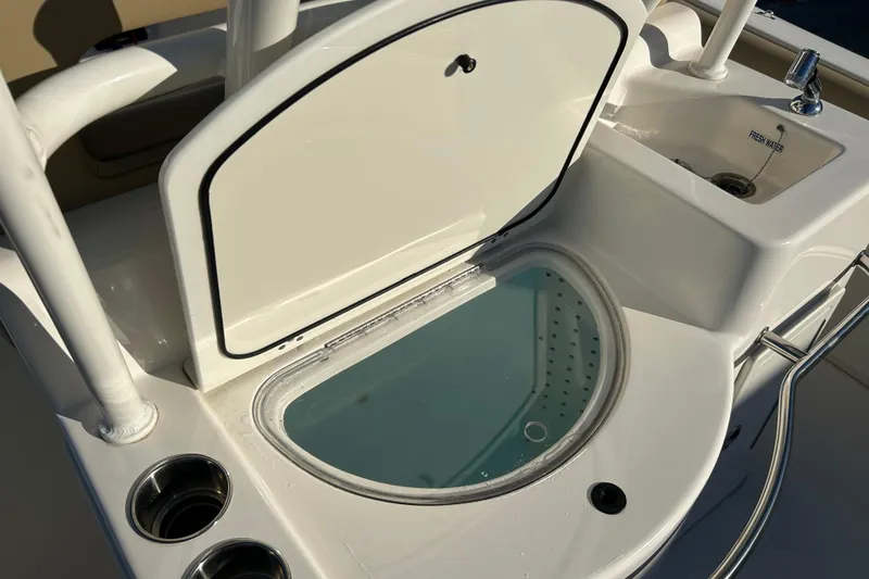 Slide: The Image of 2017 Key West Billistic 281 Center Console livewell and sink detail. - 18