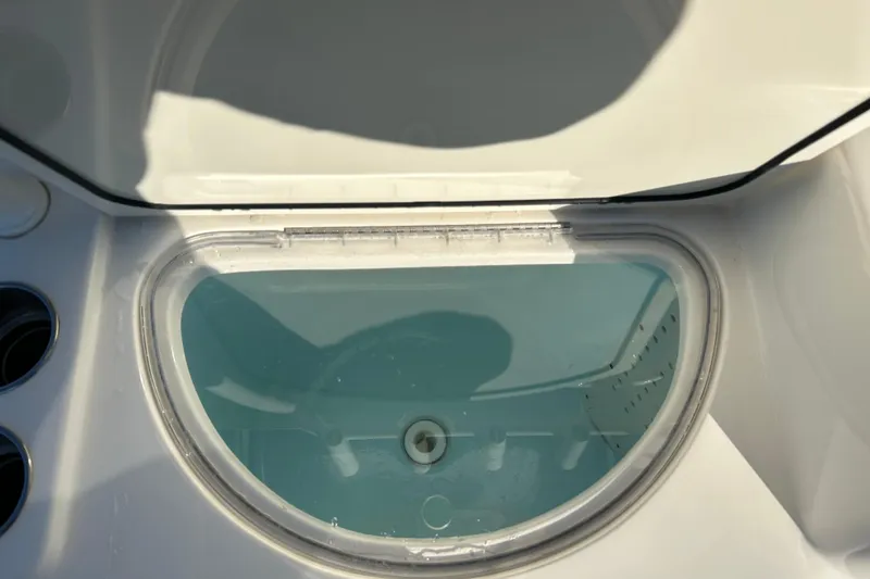 Slide: The Image of Livewell on 2017 Key West Billistic 281 Center Console boat, open lid view. - 19