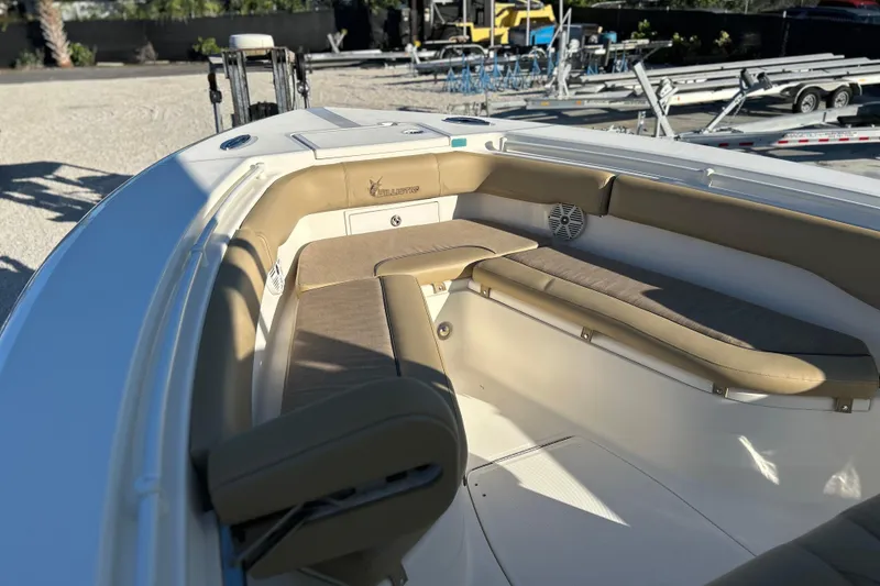 Slide: The Image of 2017 Key West Billistic 281 Center Console boat interior with cushioned seating. - 2