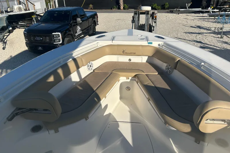 Slide: The Image of 2017 Key West Billistic 281 Center Console boat with spacious seating area. - 3