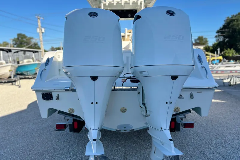 Slide: The Image of 2017 Key West Billistic 281 Center Console with dual outboard engines. - 34