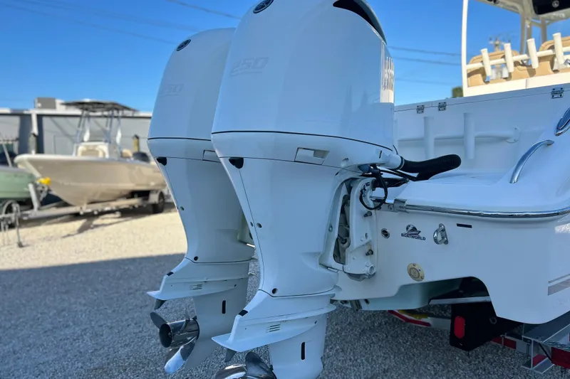 Slide: The Image of 2017 Key West Billistic 281 Center Console with dual outboard engines. - 36