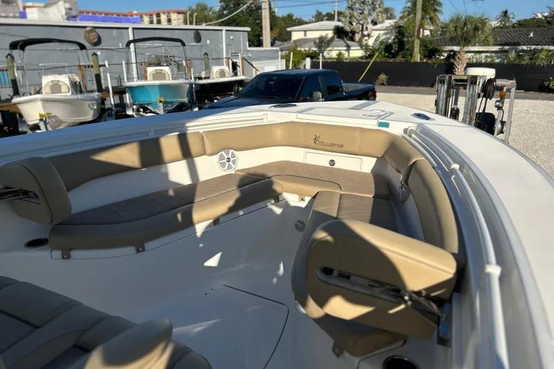 Slide: The Image of 2017 Key West Billistic 281 Center Console boat with tan seating and spacious deck. - 4