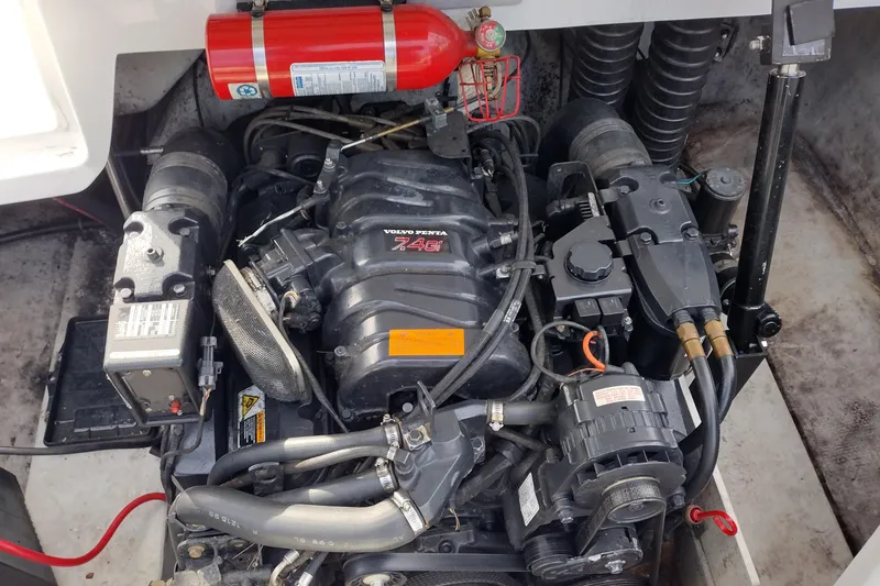 Slide: The Image of Engine compartment of a 2000 Cobalt 246 boat with Volvo Penta 7.4G engine. - 23