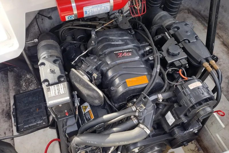 Slide: The Image of Engine compartment of a 2000 Cobalt 246 boat with Volvo Penta 7.4Gi engine. - 24