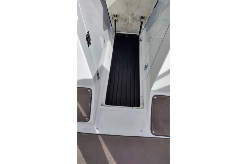 Slide: The Image of Interior view of a 2000 Cobalt 246 boat showing a narrow passageway. - 27
