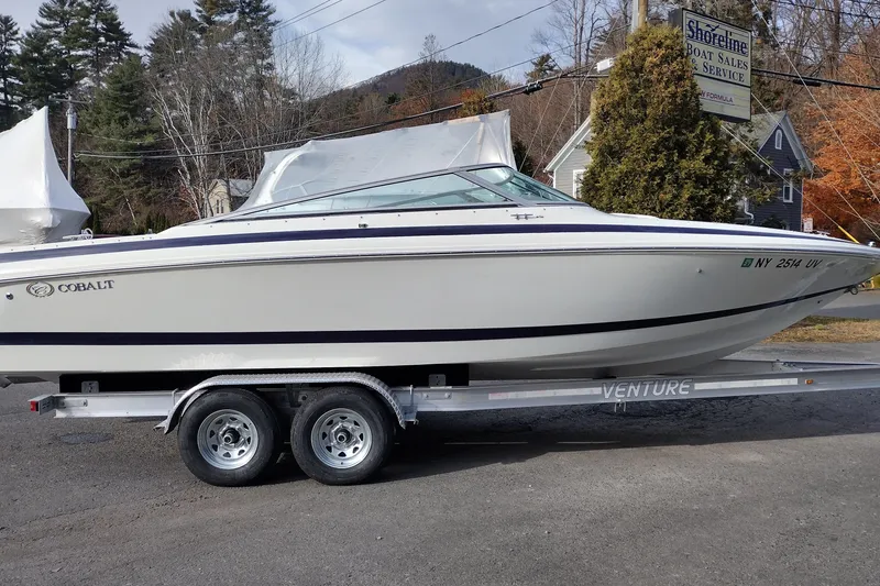 Slide: The Image of 2000 Cobalt 246 boat on trailer at Shoreline Boat Sales. - 4