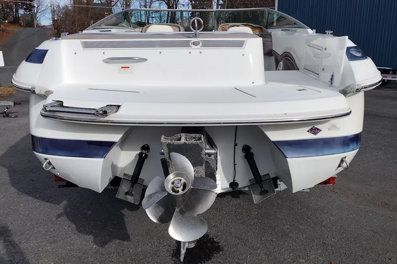 Slide: The Image of Rear view of a 2000 Cobalt 246 boat with propeller and swim platform. - 6
