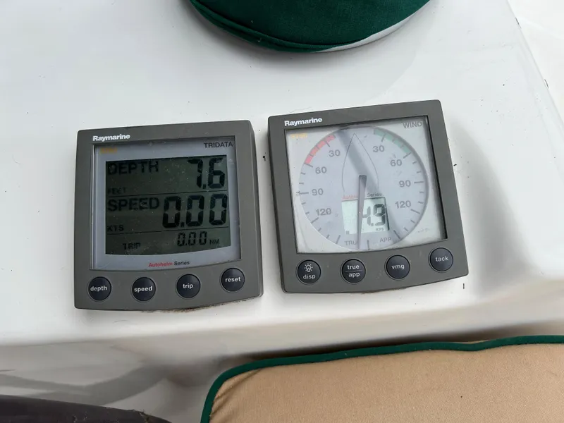 Slide: The Image of Raymarine instruments on a 2004 Beneteau 473, displaying depth and wind speed. - 12