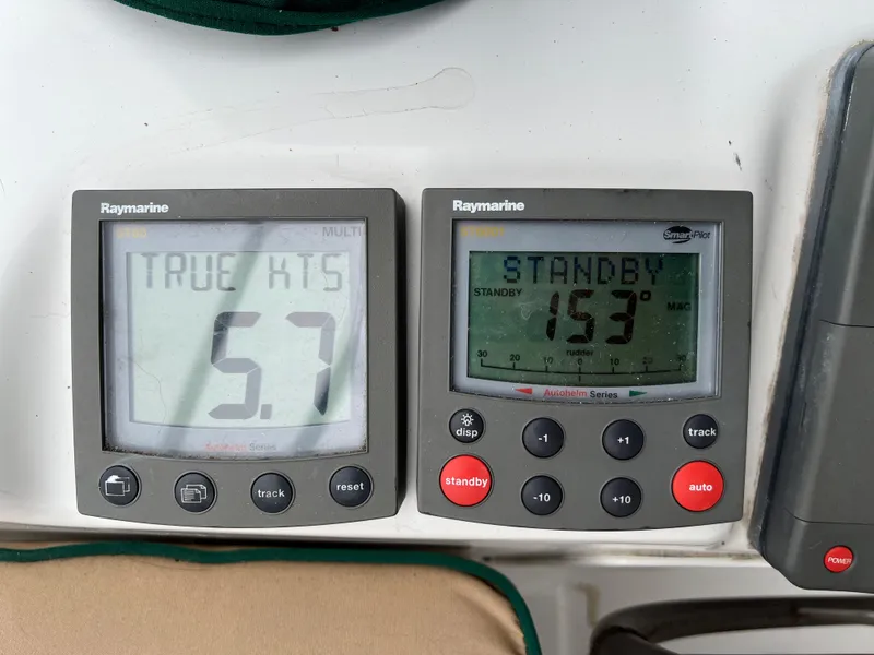 Slide: The Image of Raymarine instruments on a 2004 Beneteau 473, displaying speed and standby mode. - 14