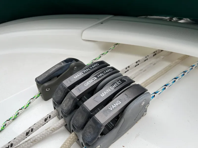 Slide: The Image of Close-up of sailing rope clutches on a 2004 Beneteau 473 yacht. - 21