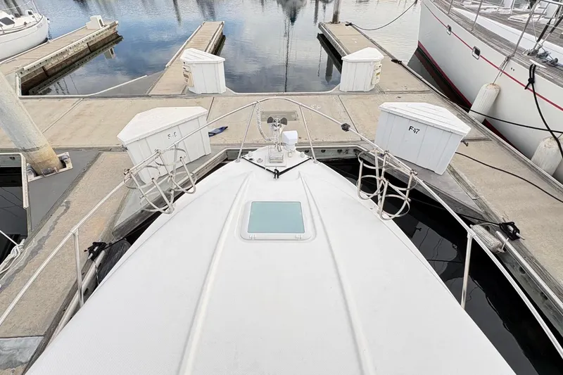 Slide: The Image of 2007 Bayliner 285 boat docked at marina, view from bow. - 5