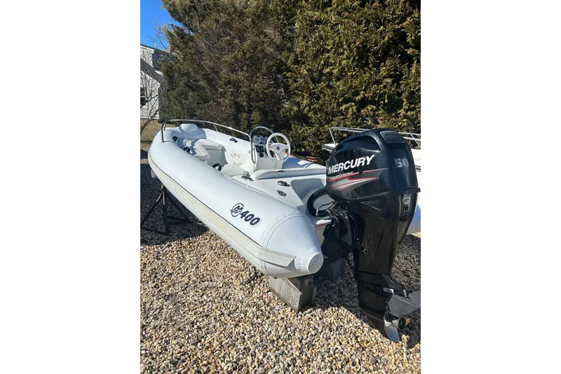 Slide: The Image of 2018 Mercury Inflatables M 400 HP boat with Mercury 50 HP outboard motor. - 3