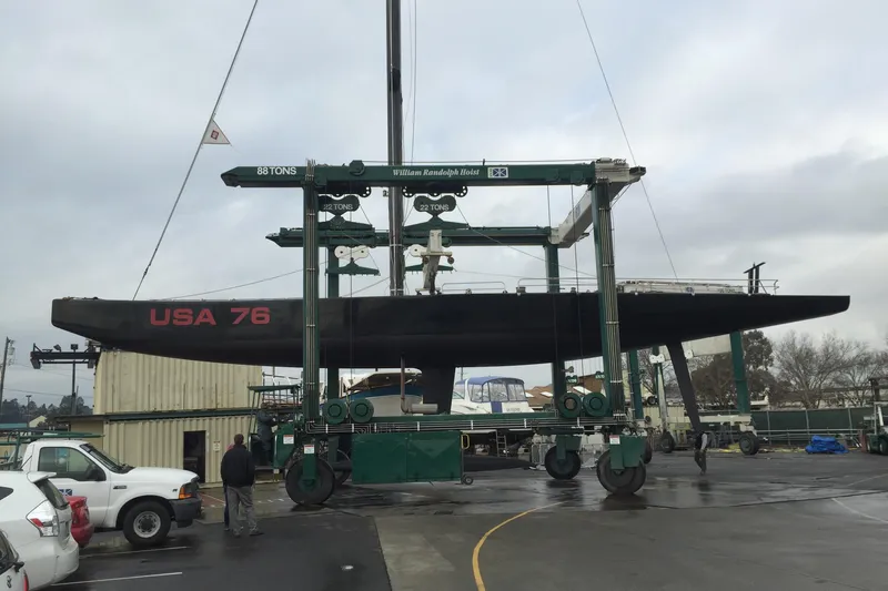 Slide: The Image of Sailboat "USA 76" lifted by crane, Custom International Americas Cup Class, 2002 model. - 15