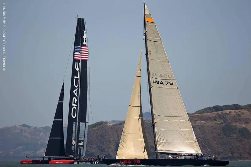Slide: The Image of Two International Americas Cup Class yachts racing on open water, 2002. - 30
