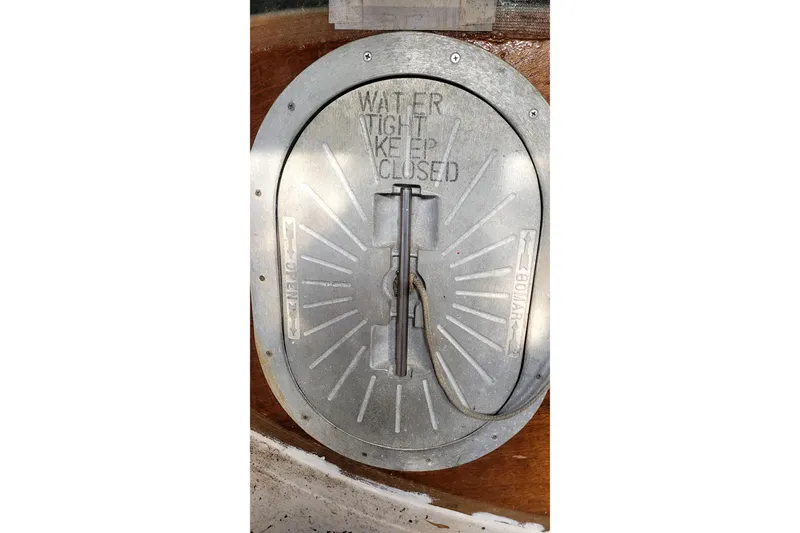 Slide: The Image of Watertight hatch on 2002 Custom International Americas Cup Class boat. - 39