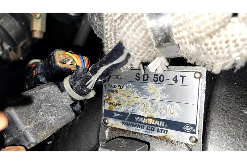 Slide: The Image of Close-up of Yanmar SD 50-4T engine label with wiring, 2002 International Americas Cup Class. - 44