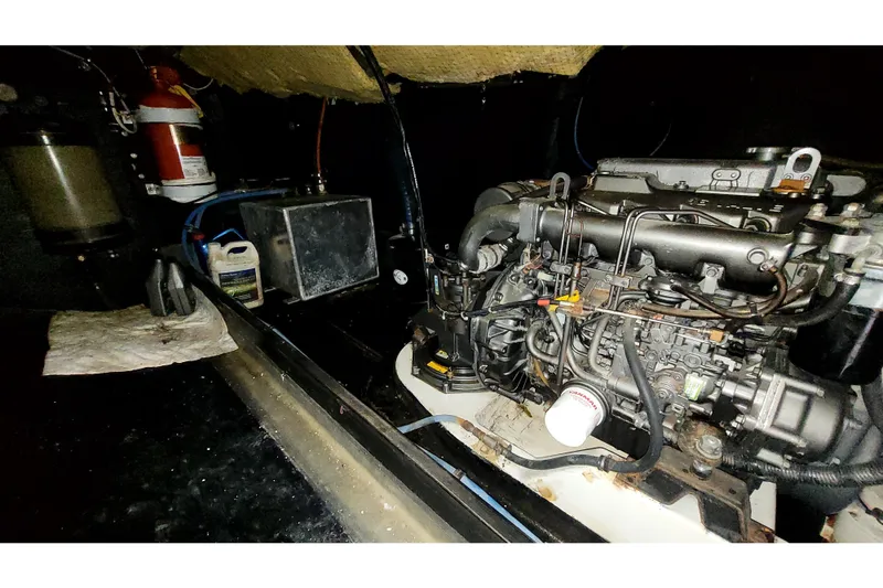 Slide: The Image of Engine room of 2002 Custom International Americas Cup Class yacht, featuring detailed machinery. - 50