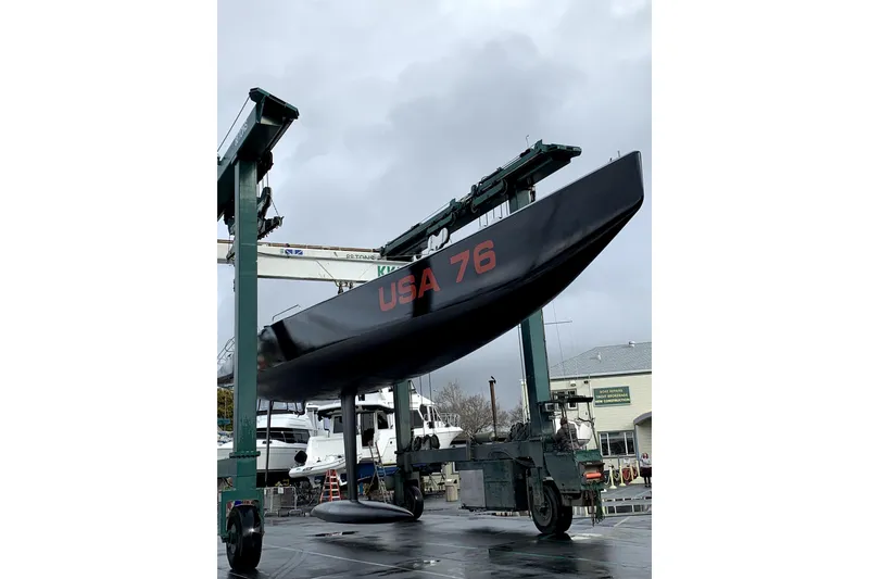 Slide: The Image of Sailboat "USA 76" from 2002, Custom International America's Cup Class, on a lift. - 6