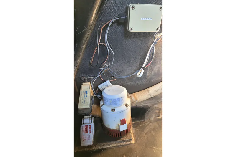 Slide: The Image of Bilge pump system in a 2002 Custom International Americas Cup Class boat. - 64