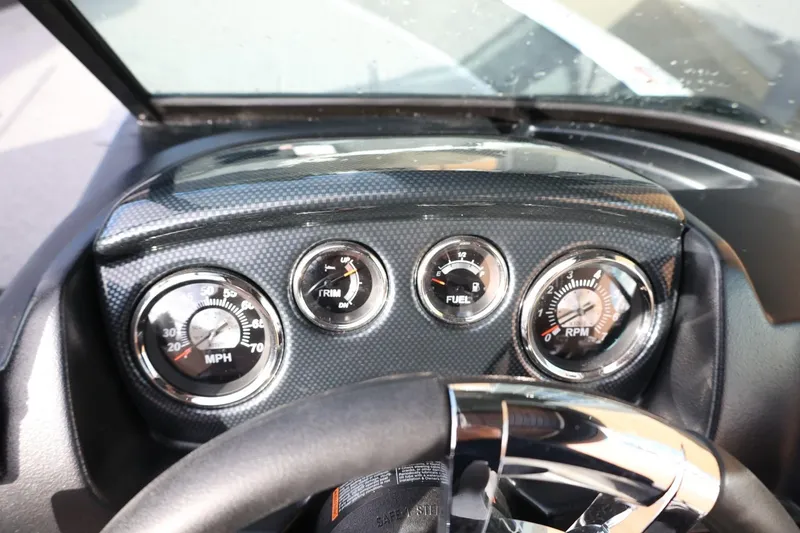 Slide: The Image of Dashboard of 2026 Lowe Fishing Machine 1675 WT with speedometer and fuel gauge. - 24